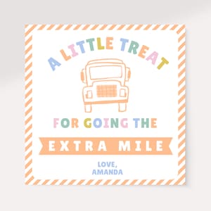 May include: Square card with a light orange and white striped border. The card features the text "A LITTLE TREAT FOR GOING THE EXTRA MILE" in pastel colors, with a truck illustration. The text "LOVE, AMANDA" is at the bottom.