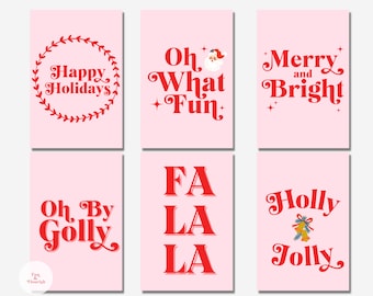 May include: Six printable Christmas cards with pink backgrounds and red text. The cards feature the phrases "Happy Holidays", "Oh What Fun", "Merry and Bright", "Oh By Golly", "Fa La La", and "Holly Jolly".