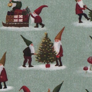 May include: A sage green fabric featuring a repeating pattern of Christmas gnomes in various poses. The gnomes wear pointed hats and red or dark clothing, interacting with pine trees, mushrooms, lanterns, and gift boxes on snowy patches.