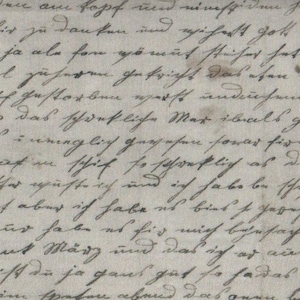Puede incluir: Primer plano de un documento manuscrito antiguo con tinta descolorida. La escritura es de estilo cursivo, con numerosas líneas de texto que cubren toda la página. El papel tiene un aspecto ligeramente envejecido y texturizado.