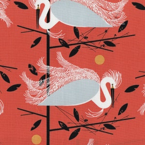 May include: A repeating pattern of white egrets with black beaks and white feathers perched on black branches against a red background. The egrets are in a stylized, graphic design with a simplified, geometric shape.