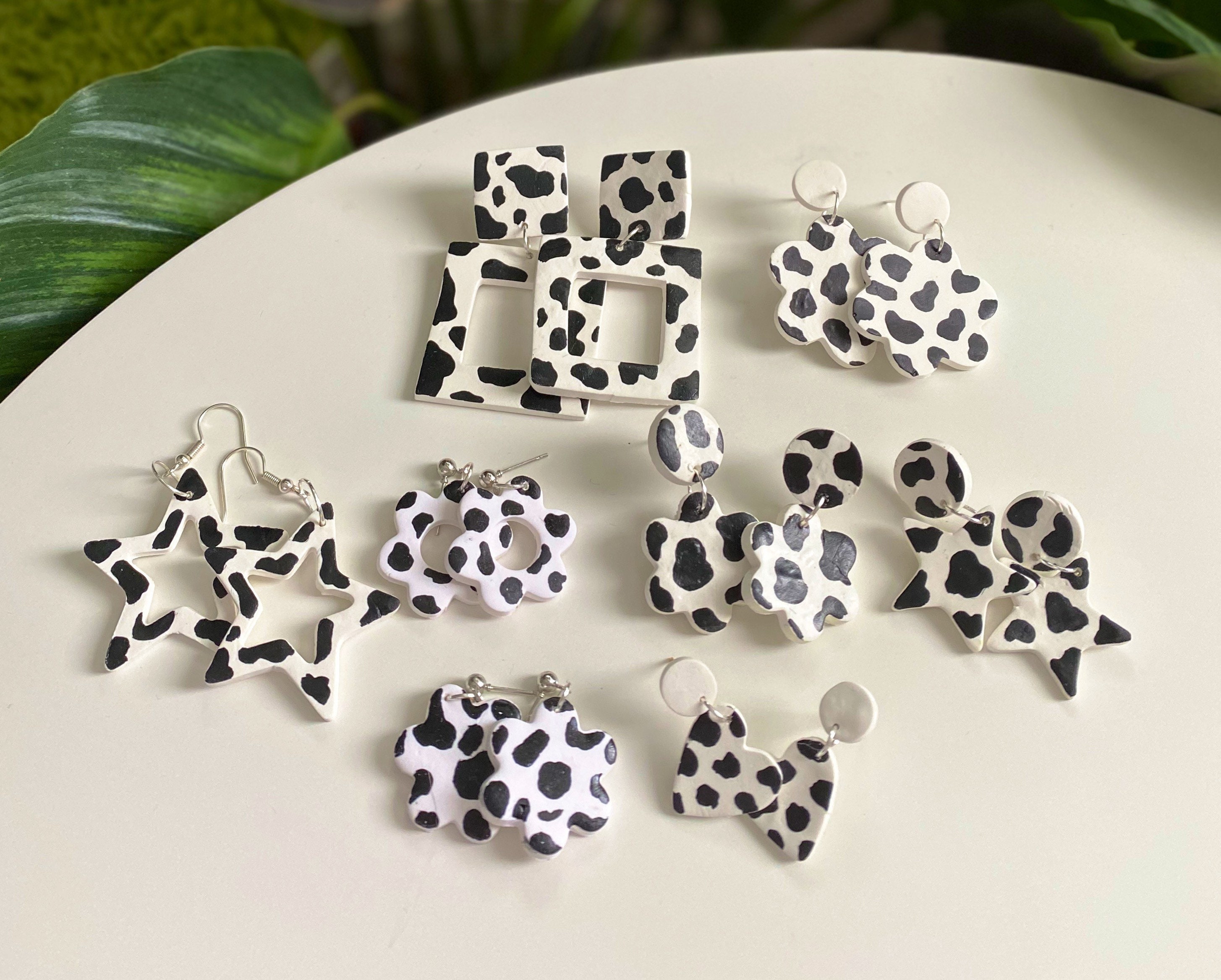 Cow print on sale polymer clay earrings