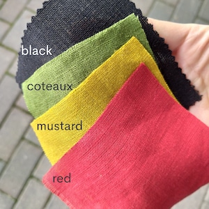 May include: Four fabric swatches in different colors: black, green, yellow, and red. The swatches are labeled "black", "coteaux", "mustard", and "red".