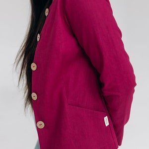 Cosy heavy linen jacket with buttons and pockets is ideal choice for office woman look. Handmade linen blazer is designed in regular fit. Women's linen top is fair made in small family studio. There are two colours pink, natural linen