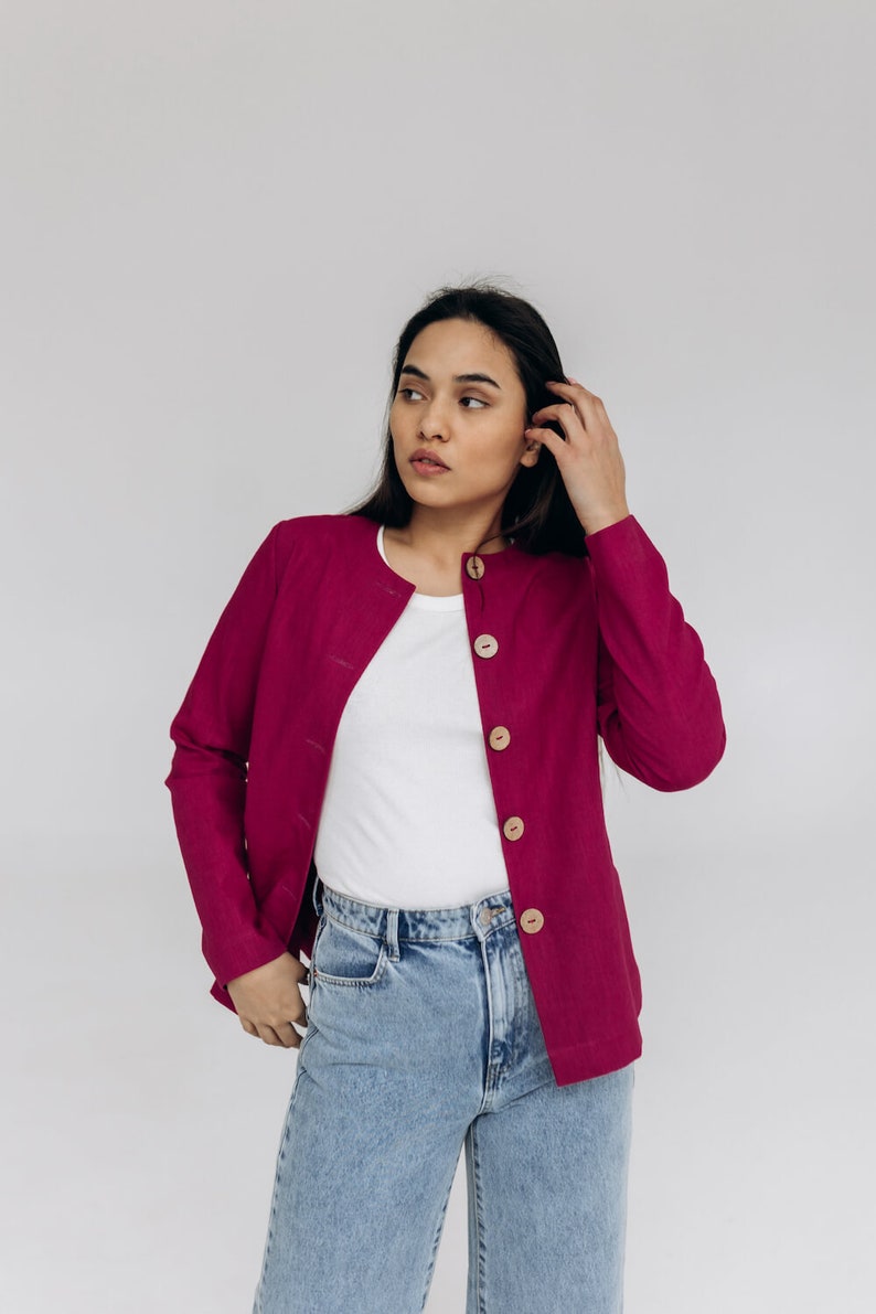 Cosy heavy linen jacket with buttons and pockets is ideal choice for office woman look. Handmade linen blazer is designed in regular fit. Women's linen top is fair made in small family studio. There are two colours pink, natural linen