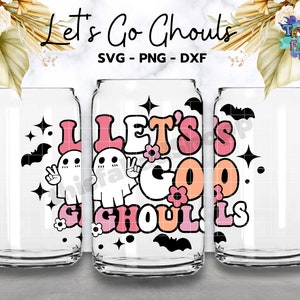 May include: A set of three clear glass tumblers with a design featuring ghosts, bats, and the text "Let's Go Ghouls" in pink, orange, and white.