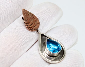 Handcrafted Sterling Silver Blue Topaz Teardrop Pendant – Gold Accent