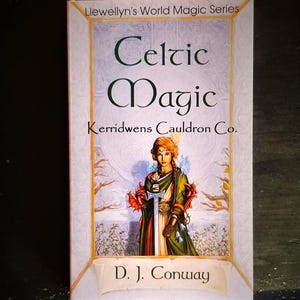 May include: A book titled "Celtic Magic" by D.J. Conway. The book is part of the Llewellyn's World Magic Series and features a woman holding a sword in a forest setting.