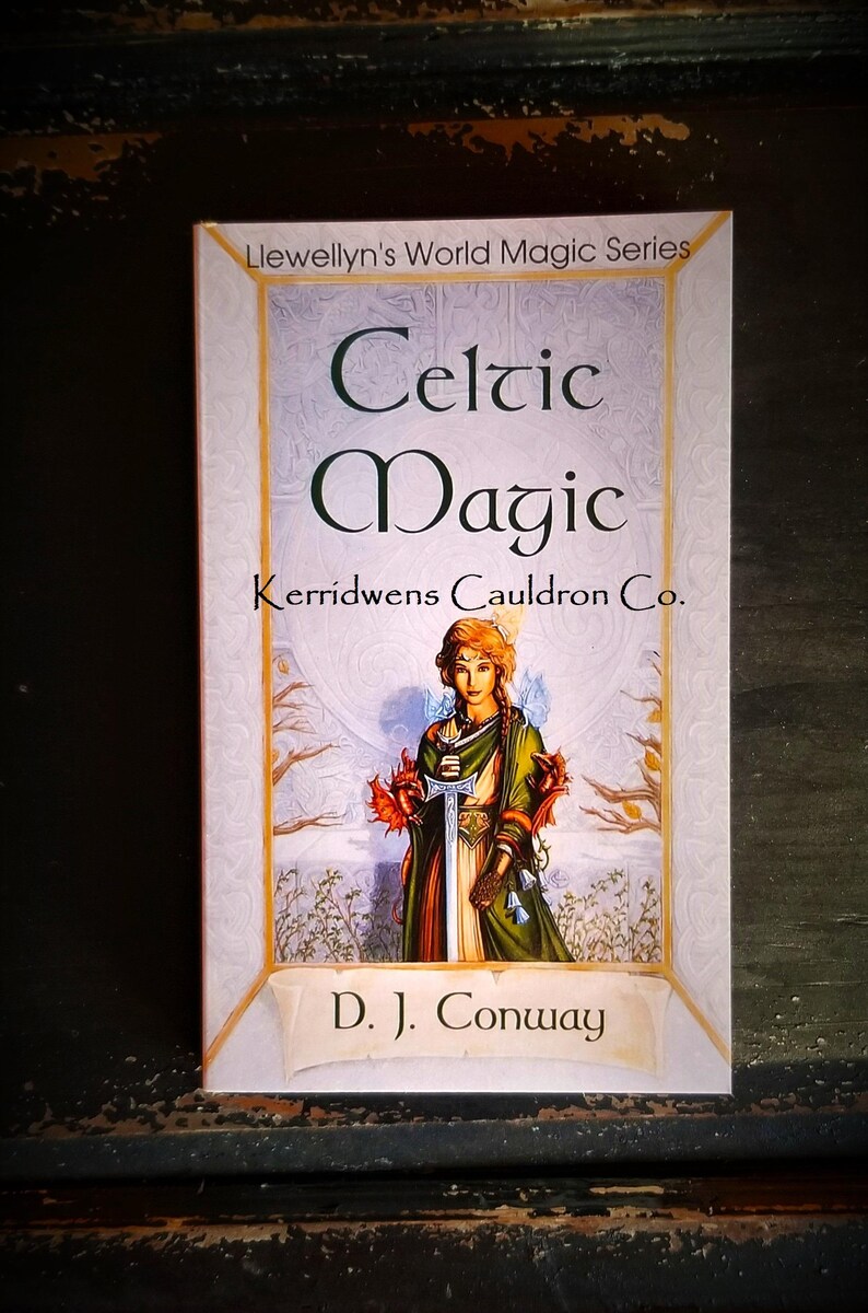 May include: A book titled "Celtic Magic" by D.J. Conway. The book is part of the Llewellyn's World Magic Series and features a woman holding a sword in a forest setting.