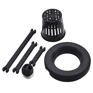 May include: A collection of black hydroponic system components, including a slotted pot, a circular foam ring, and several wrench-shaped pieces. The items are arranged on a white background, suggesting a focus on gardening or plant care.