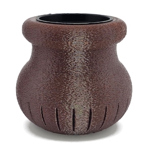 May include: A brown, textured vase with a bulbous body and a flared rim. The vase has vertical slits near the base and a black interior. The overall design is rustic and organic.