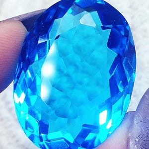 Topazio blu ovale sfuso da 75+ ct con certificato