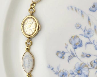 Vintage MANUAL Benrus Gold kaputte Porzellanuhr