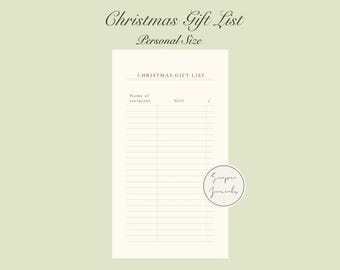 May include: A cream-colored Christmas Gift List journal with the text "Christmas Gift List Personal Size" at the top. The journal has lines for recipients and gifts, with a check box. A circular logo is in the bottom right corner.