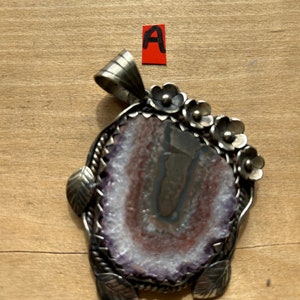 Amethyst pendant made with base metal Hand made Nepali jewelry. Made in Nepal
