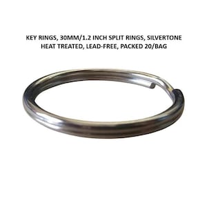 May include: A silver-toned key ring, approximately 1.2 inches in diameter, is shown against a white background. The text above the key ring reads: KEY RINGS, 30MM/1.2 INCH SPLIT RINGS, SILVERTONE HEAT TREATED, LEAD-FREE, PACKED 20/BAG.