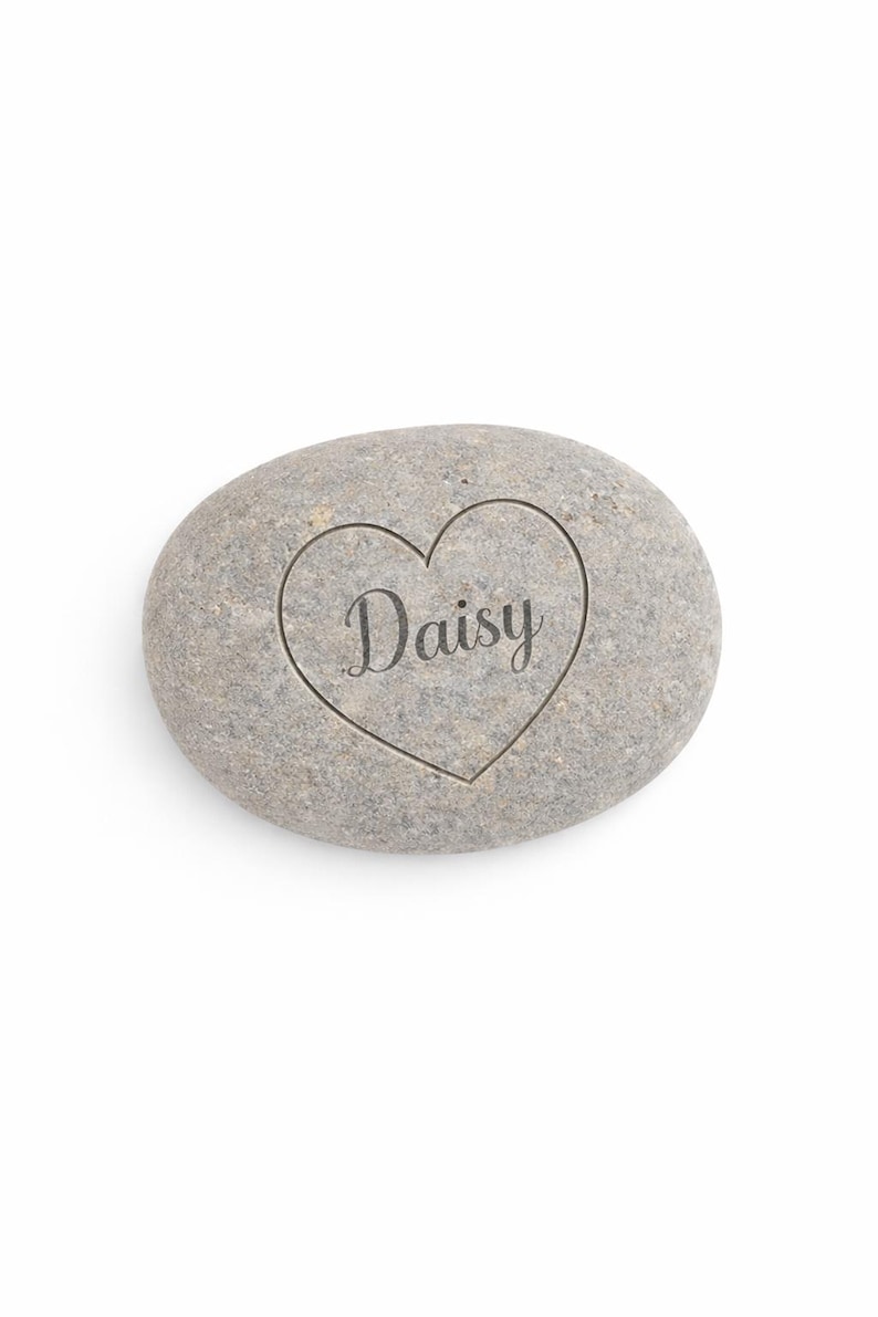Personalised engraved stone with name Daisy inside heart design, clean product image on white background