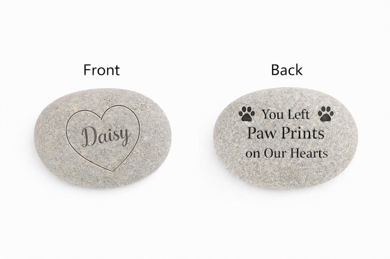Front and back view of personalised pet memorial stone showing engraved name Daisy in heart and memorial message with paw prints