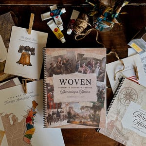 May include: A collection of educational materials, including a spiral-bound book titled "WOVEN History & Geography Series," and various printed papers. The papers feature historical maps, illustrations, and text, with paint tubes and brushes visible.