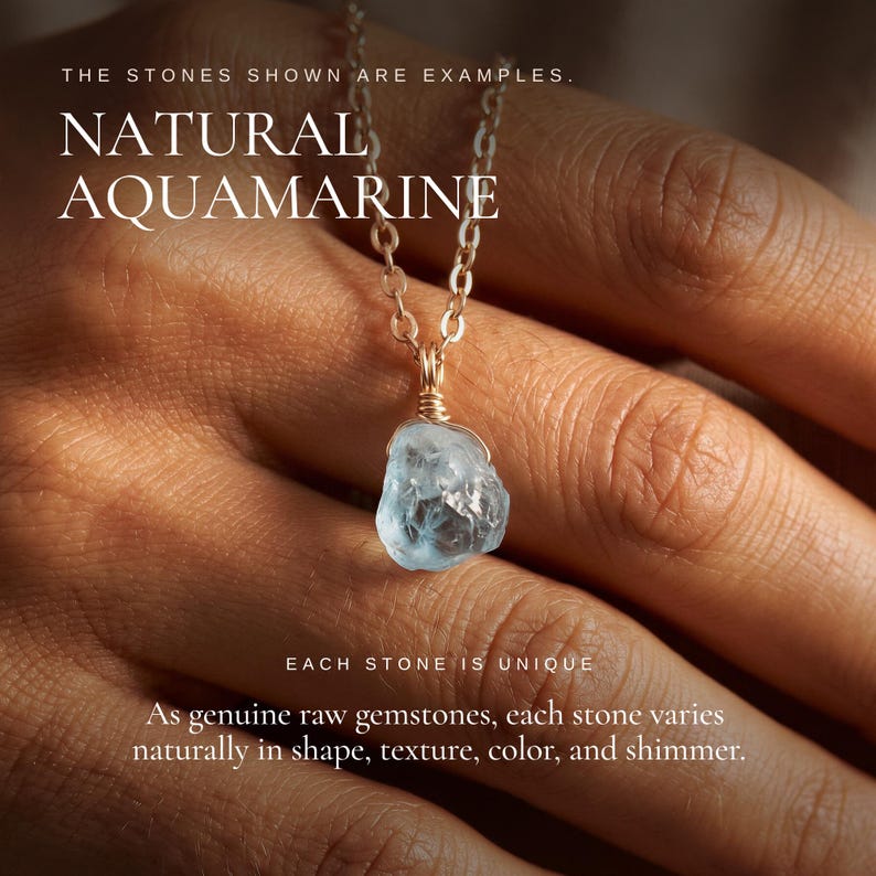 May include: A raw, light blue aquamarine gemstone pendant suspended on a thin gold-colored metal chain. The text on the image reads: THE STONES SHOWN ARE EXAMPLES. NATURAL AQUAMARINE. EACH STONE IS UNIQUE. As genuine raw gemstones, each stone varies.