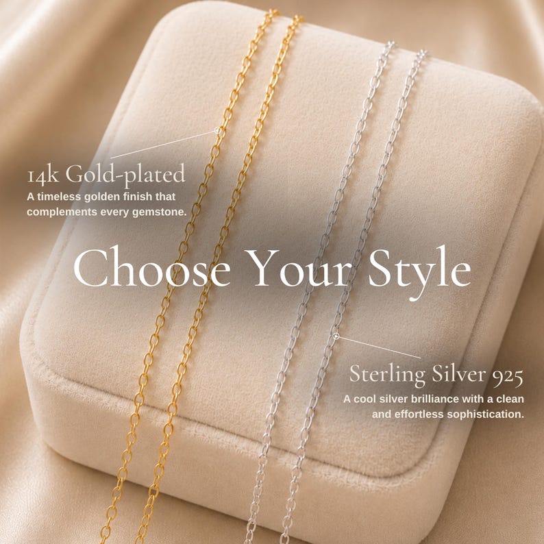 May include: Two delicate metal chains, one 14k gold-plated and one sterling silver 925, displayed side by side. The image features the text Choose Your Style, 14k Gold-plated, A timeless golden finish that complements every gemstone, Sterling Silver 925, and A cool silver brilliance with a clean and effortless sophistication.