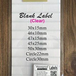 May include: A sheet of clear, waterproof, write-on labels in various sizes, including 30x15mm, 46x10mm, 47x15mm, 45x25mm, 50x30mm, Circle 22mm, and Circle 30mm. The labels are tear-resistant and easy to write on with a permanent marker.