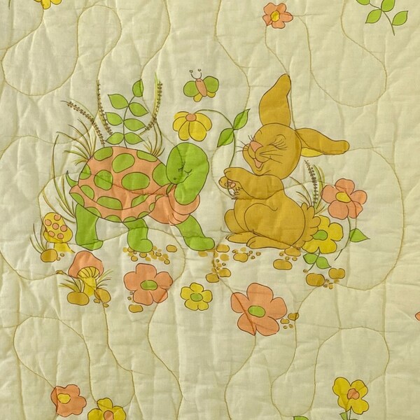 Vintage yellow "tortoise and the hare" baby blanket / quilt