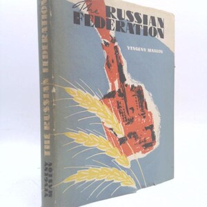 May include: A vintage book titled "The Russian Federation" by Yevgeny Maslov. The cover features a blue background with a red and black illustration and yellow wheat stalks. The book's spine also displays the title.