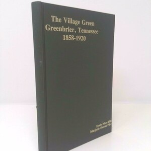 May include: A dark green hardcover book titled "The Village Green Greenbrier, Tennessee 1858-1920" with the authors' names Doris Moss Hill and Marjorie Shores Pike printed on the bottom right corner.
