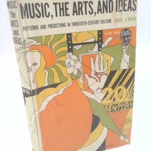 May include: A book cover with a colorful abstract design featuring a film reel, a hand, and a person holding a baton. The title of the book is "Music, The Arts, and Ideas: Patterns and Predictions in Twentieth-Century Culture" by Edna B. Meyer.