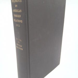 May include: A dark gray hardcover book titled "Documents on American Foreign Relations 1963." The book's spine features gold lettering with the title, year, and the Council on Foreign Relations. The book is in good condition.