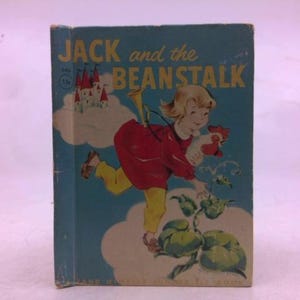 May include: Vintage children's book titled "Jack and the Beanstalk." The cover features a whimsical illustration of a child in red and yellow clothing, holding a rooster, with a castle and beanstalk in the background. The book has a blue cover.