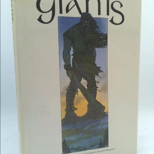 May include: A book cover with the title "GIANTS" in large, stylized lettering. The cover features an illustration of a large, muscular giant standing on a mountaintop, with a sunset in the background.
