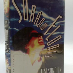 Sorrow Floats by Tim Sandlin