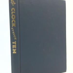 May include: A hardcover book titled "The Clock Struck Ten" with a dark blue cover. The title and author's name are in gold lettering on the spine. The book is in good condition.