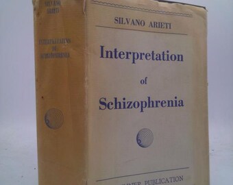 May include: A vintage book titled "Interpretation of Schizophrenia" by Silvano Arieti. The book has a light tan cover with blue text. The cover also includes the text "A Brunner Publication". The book's spine is also light tan.