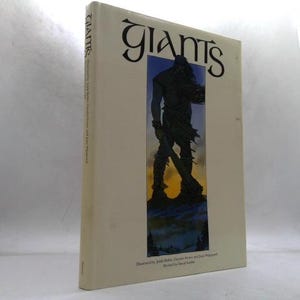 May include: A white ceramic mug with a black handle and the text "But First, Coffee" in a black, bold font. The mug is sitting on a wooden surface. The mug is approximately 4 inches tall.