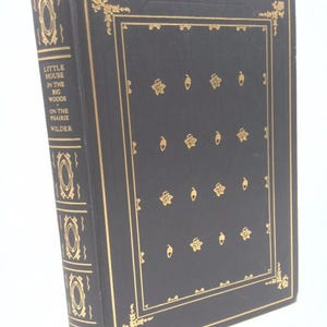 Little House in the Big Woods/Little House on the Prairie by Laura Ingalls Wilder