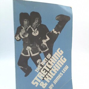 May include: A vintage book cover titled "The Art of Stretching & Kicking" by James Lew. The cover features two men in martial arts attire, one kicking. The background is light blue.