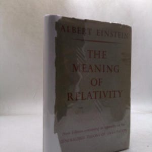 May include: A hardcover book titled "The Meaning of Relativity" by Albert Einstein. The book has a gray cover with red lettering and a white spine. The book is a new edition containing an appendix on the generalized theory of gravitation.