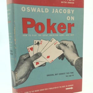 May include: Vintage book cover for "Oswald Jacoby on Poker." The cover features a red and blue color scheme with the title "Poker" in large red letters. The image shows hands holding playing cards. The text reads "How to play the great American game - and win!"