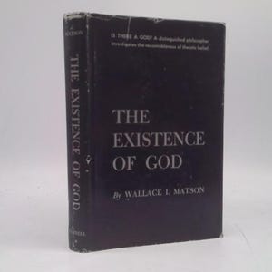 May include: A hardcover book titled "The Existence of God" by Wallace I. Matson. The book has a black cover with white lettering. The spine reads "The Existence of God". The book is on a white surface.