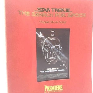 May include: A red folder with the title "STAR TREK III THE SEARCH FOR SPOCK" in gold lettering. The folder contains a movie script and a promotional image of Spock. The Premiere logo is at the bottom.