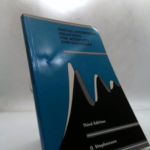 May include: A textbook titled "Partial Differential Equations for Scientists and Engineers" with a blue cover. The cover features a black and white graphic of a mountain range. The book is the third edition by G. Stephenson.