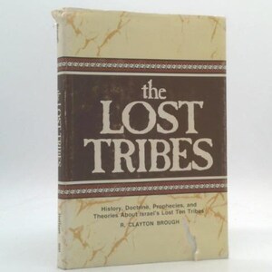 May include: A hardcover book titled "The Lost Tribes." The cover is tan with brown accents and text. The title is in large white letters on a brown background. The book's subtitle and author's name are also visible.