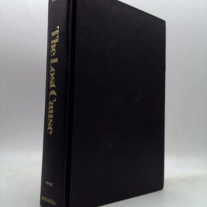 May include: A black hardcover book titled The Lost Cause by Pollard, published by Bonanza. The book is positioned vertically, showing the front cover and the spine, which features gold lettering against the solid black textured material.