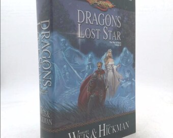 May include: A hardcover book titled "Dragons Lost Star" by Margaret Weis & Tracy Hickman. The book cover features a fantasy illustration of a knight and a woman in a white dress standing in a snowy landscape with a group of ghostly figures in the background.