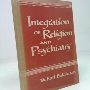 May include: A hardcover book titled "Integration of Religion and Psychiatry" by W. Earl Biddle, M.D. The book has a red cover with white lettering. The spine displays the title and author's name. The book is slightly angled.