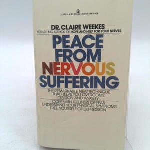 May include: A paperback book titled "Peace From Nervous Suffering" by Dr. Claire Weekes. The cover features the title in large, colorful letters against a cream background. The book promises help with tension, anxiety, and depression.
