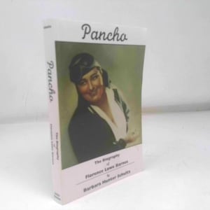 May include: A book titled "Pancho" with a portrait of a woman on the cover. The cover features the title in a script font and the subtitle "The Biography of Florence Lowe Barnes" by Barbara Hunter Schultz.